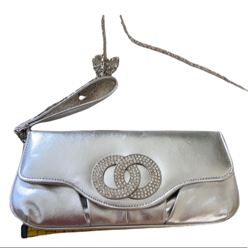 Silver clutch with removable chain and wrist strap